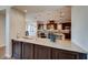 Kitchen wet bar with granite countertop and sink at 59 Portezza Dr, Henderson, NV 89011