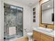 Modern bathroom featuring a glass-enclosed shower, stylish vanity, and contemporary fixtures at 591 Overlook Rim Dr, Henderson, NV 89012