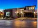 Stunning two-story home with a modern design, pristine landscaping, and a spacious three-car garage at 591 Overlook Rim Dr, Henderson, NV 89012