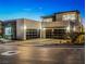 Beautiful modern home featuring a three-car garage and sleek design elements at 591 Overlook Rim Dr, Henderson, NV 89012