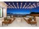 Outdoor patio with fire pit and city views at night at 591 Overlook Rim Dr, Henderson, NV 89012