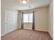 Spacious bedroom with carpet and window coverings at 5993 Lambert Bridge Ave, Las Vegas, NV 89139