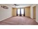 Bright bedroom featuring neutral walls and carpeting at 5993 Lambert Bridge Ave, Las Vegas, NV 89139