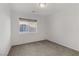 Bright bedroom with neutral walls and carpet at 7075 Jasper Hill Way, Las Vegas, NV 89118