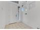 Bright entryway with tiled floor and a view of the staircase at 7075 Jasper Hill Way, Las Vegas, NV 89118