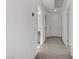 Bright hallway with carpet and access to multiple rooms at 7075 Jasper Hill Way, Las Vegas, NV 89118