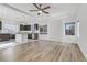 Modern kitchen with dark cabinets and an island at 7075 Jasper Hill Way, Las Vegas, NV 89118