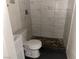 Updated bathroom with shower and tile flooring at 721 N 1St St, Las Vegas, NV 89101