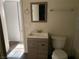 Bathroom with vanity, toilet, and mirror at 721 N 1St St, Las Vegas, NV 89101