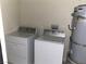 Washer, dryer, and water heater in a dedicated laundry room at 721 N 1St St, Las Vegas, NV 89101