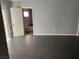 Open living area with tile floors and access to bedroom at 721 N 1St St, Las Vegas, NV 89101