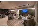 Finished basement with comfortable seating and bar area at 7310 Heron Canyon Ct, Las Vegas, NV 89117