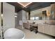 Modern bathroom with double vanity and large soaking tub at 7310 Heron Canyon Ct, Las Vegas, NV 89117