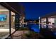 Night view of the pool and patio area at 7310 Heron Canyon Ct, Las Vegas, NV 89117