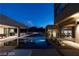 Stunning pool and patio area at night at 7310 Heron Canyon Ct, Las Vegas, NV 89117