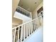 View of a two story home's staircase and upper level at 7529 Earnshaw Ave, Las Vegas, NV 89149