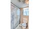 Bathroom with shower and toilet at 7741 Orchard Wood Ct, Las Vegas, NV 89131