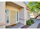 Inviting front entrance with security door and welcoming doormat at 7741 Orchard Wood Ct, Las Vegas, NV 89131