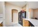 Spacious kitchen with black appliances and wood cabinets at 7741 Orchard Wood Ct, Las Vegas, NV 89131