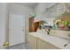 Laundry room with washer, dryer, and storage shelves at 7741 Orchard Wood Ct, Las Vegas, NV 89131