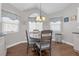 Casual dining area with a round table and chairs near kitchen at 7859 Lisa Marie Ct, Las Vegas, NV 89113