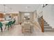 Dining area with wooden table and green chairs at 8035 Skye Foxx St, Las Vegas, NV 89166