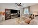 Living room with modern fireplace and built-in shelving at 8035 Skye Foxx St, Las Vegas, NV 89166