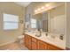 Bathroom with double vanity, tile flooring and shower/tub combo at 8805 Jeffreys St # 1032, Las Vegas, NV 89123