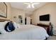 Main bedroom with a comfortable bed and access to the bathroom at 8805 Jeffreys St # 1032, Las Vegas, NV 89123