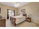 Spacious bedroom with ceiling fan, large window, and plenty of natural light at 8805 Jeffreys St # 1032, Las Vegas, NV 89123