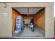 Garage with motorcycle, shelving, and ample storage at 8805 Jeffreys St # 1032, Las Vegas, NV 89123