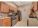 Well-equipped kitchen boasts ample cabinetry and granite countertops at 8805 Jeffreys St # 1032, Las Vegas, NV 89123