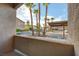 Private patio with view of the community and parking at 8805 Jeffreys St # 1032, Las Vegas, NV 89123