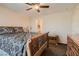 Bedroom with wooden sleigh bed and en-suite bathroom access at 9103 Mcginnis Ave, Las Vegas, NV 89148