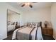 Bright bedroom with mirrored closet and neutral decor at 9103 Mcginnis Ave, Las Vegas, NV 89148