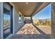 Covered patio with access to backyard at 928 Calluna Hills Ln, Las Vegas, NV 89138