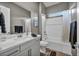 Clean bathroom with a bathtub, shower, and modern vanity at 928 Calluna Hills Ln, Las Vegas, NV 89138