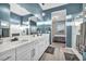 Modern bathroom boasts double vanity and a walk-in shower at 928 Calluna Hills Ln, Las Vegas, NV 89138