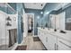 Elegant bathroom with double sinks, shower, and stylish decor at 928 Calluna Hills Ln, Las Vegas, NV 89138