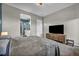 Main bedroom with ensuite bathroom and built-in TV stand at 928 Calluna Hills Ln, Las Vegas, NV 89138