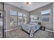 Spacious bedroom with large windows and plush bedding at 928 Calluna Hills Ln, Las Vegas, NV 89138