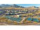 Aerial view of community featuring tennis and pickleball courts at 928 Calluna Hills Ln, Las Vegas, NV 89138