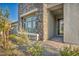 House exterior with stone accents and a covered entryway at 928 Calluna Hills Ln, Las Vegas, NV 89138