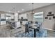 Modern kitchen with white cabinets, stainless steel appliances, and an island at 928 Calluna Hills Ln, Las Vegas, NV 89138