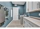 Clean laundry room featuring built-in cabinets and storage at 928 Calluna Hills Ln, Las Vegas, NV 89138