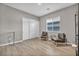 Home office with wood-look floors and two chairs at 928 Calluna Hills Ln, Las Vegas, NV 89138