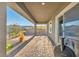 Covered patio with pavers and access to the backyard at 928 Calluna Hills Ln, Las Vegas, NV 89138