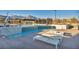 Community pool with lounge chairs at 928 Calluna Hills Ln, Las Vegas, NV 89138