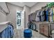 Large walk-in closet with custom shelving and drawers at 928 Calluna Hills Ln, Las Vegas, NV 89138