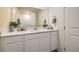 Modern bathroom with white cabinets and a clean, updated look at 9392 Serene Harbor St # Lot 24, Las Vegas, NV 89178